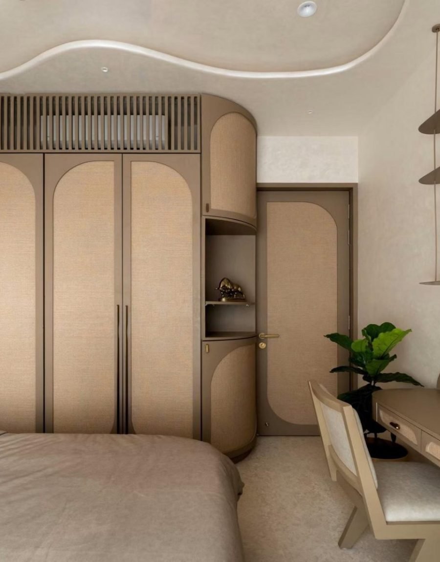 Arched fabric wardrobe with matching door and curved ceiling