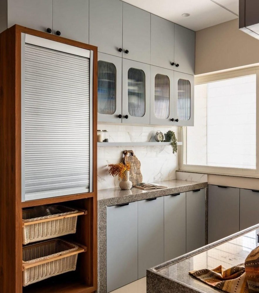 Utility kitchen with reeded glass and grey cabinets
