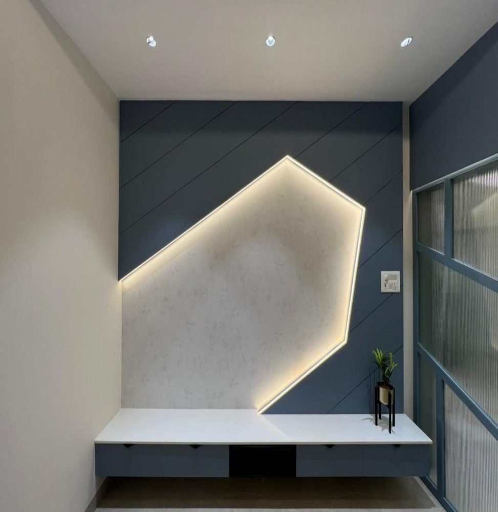 Faceted LED wall with floating bench