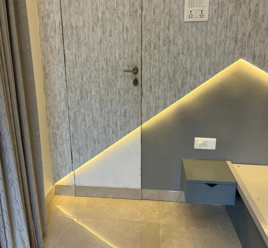 Angular lit wall and floating bedside