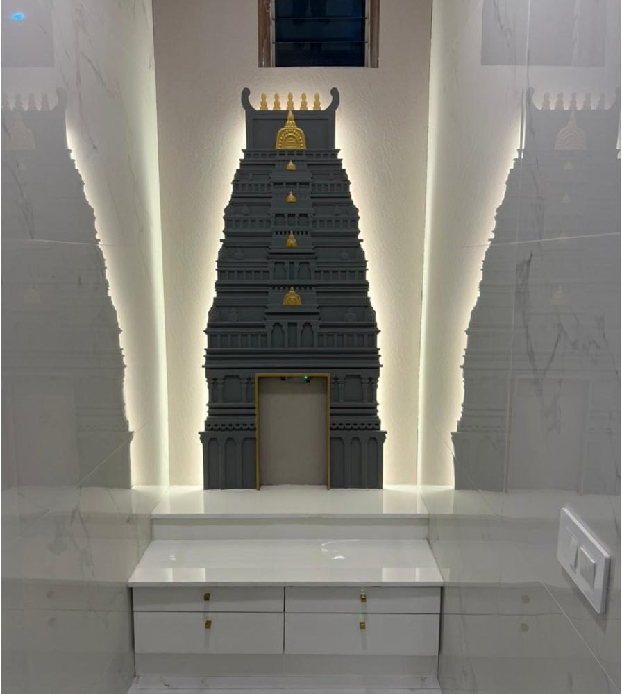 Marble-lined pooja with gopuram relief and concealed light